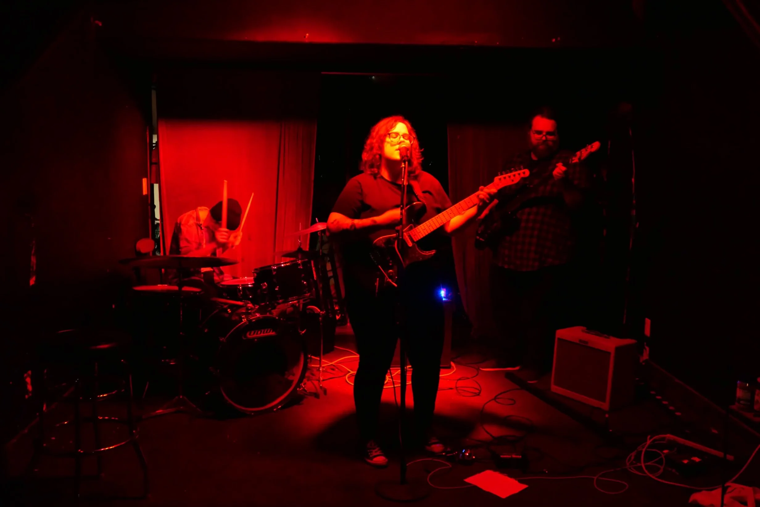 Kate Bivona performing live with her band Dirt Skirt.