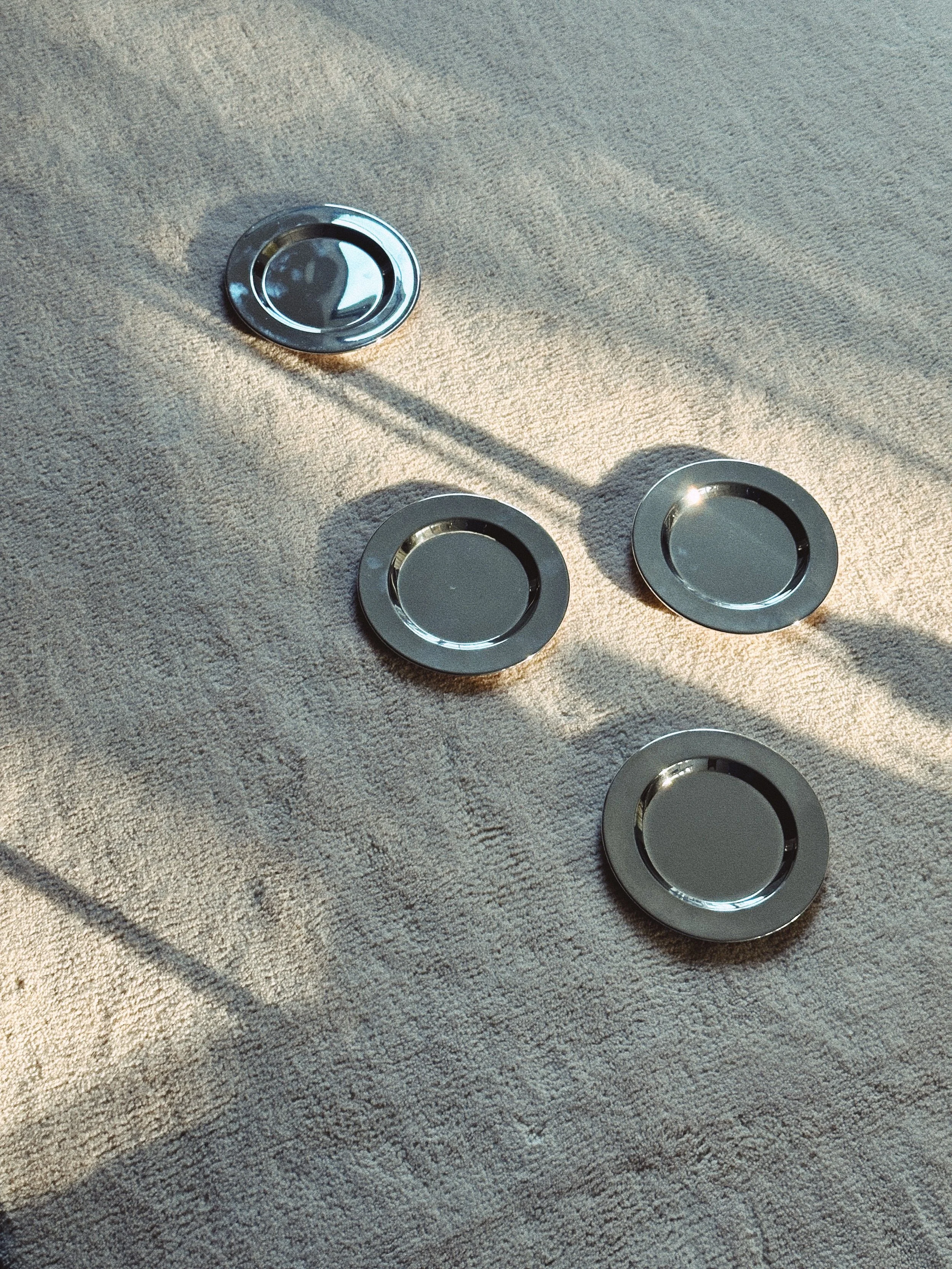 Set of four vintage silver plated dessert/side plates.