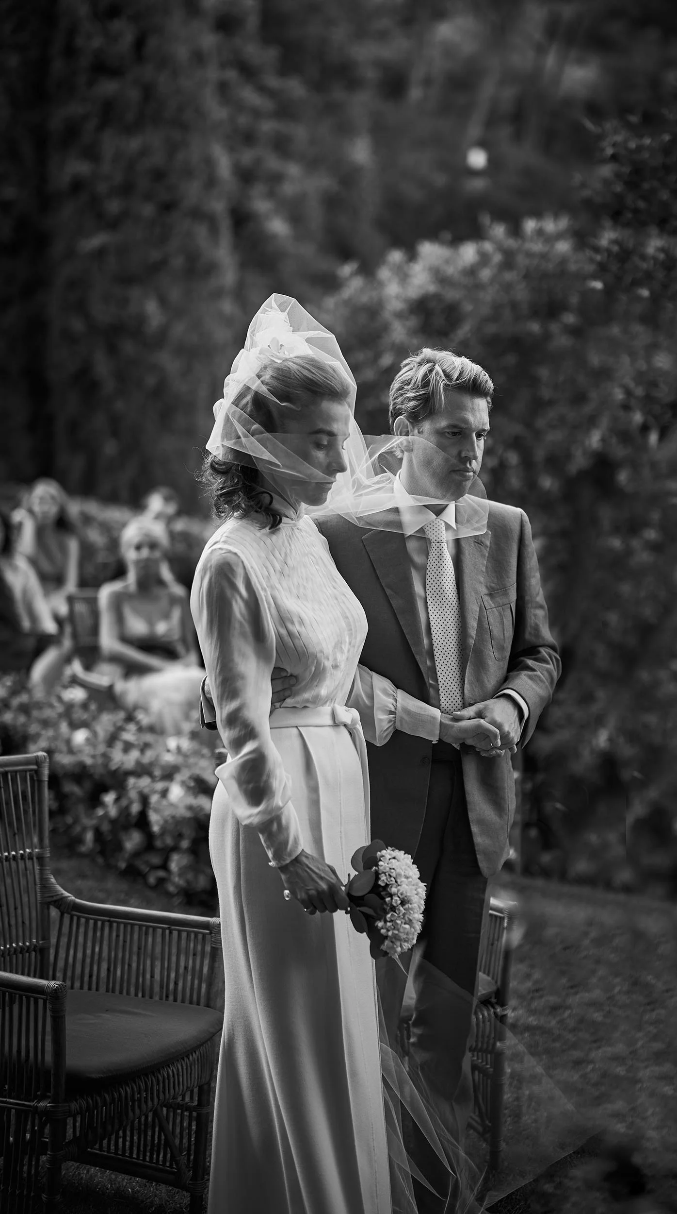 Black and white candid photo of bride and groom at Hotel Il Pellicano, Porto Ercole. Authentic destination wedding photography in Tuscany.