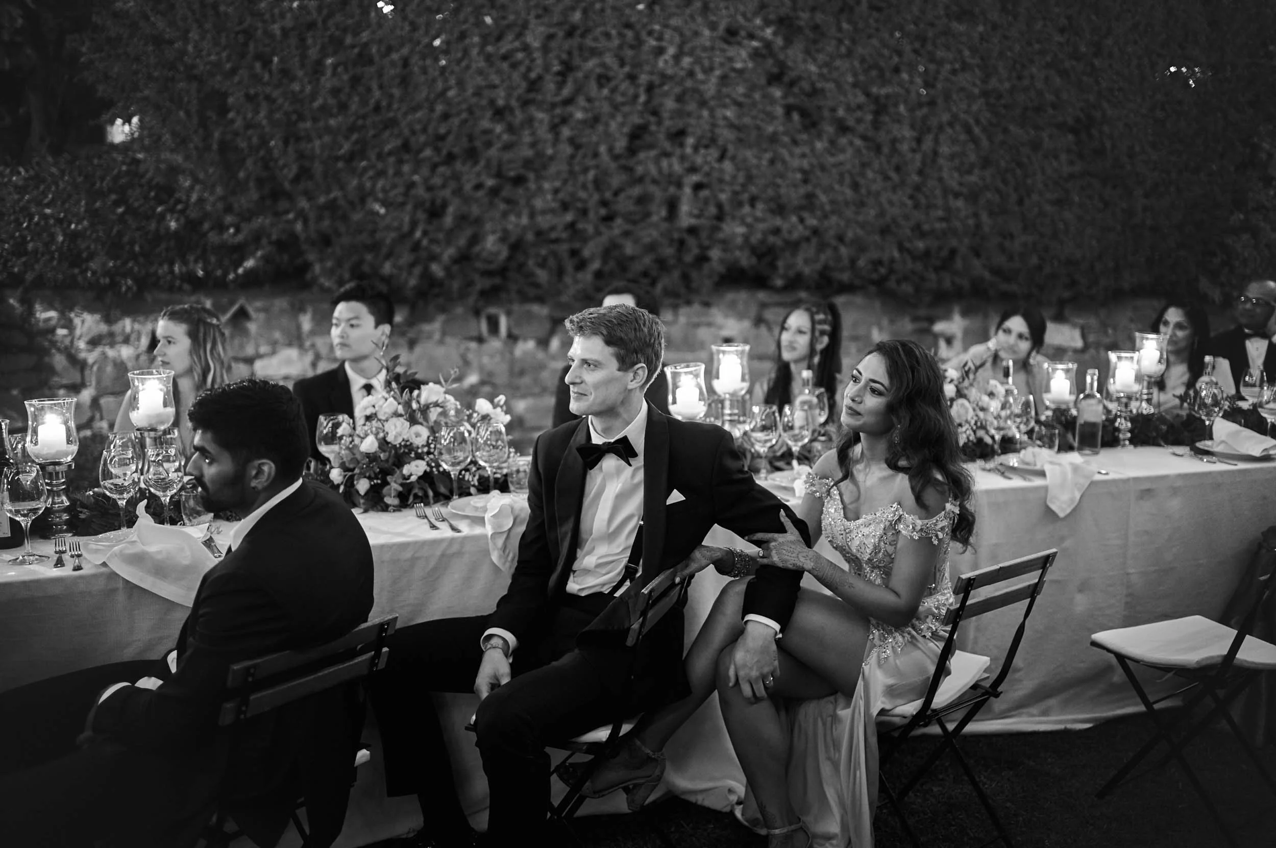 Couple listening to speeches at the table (black and white)