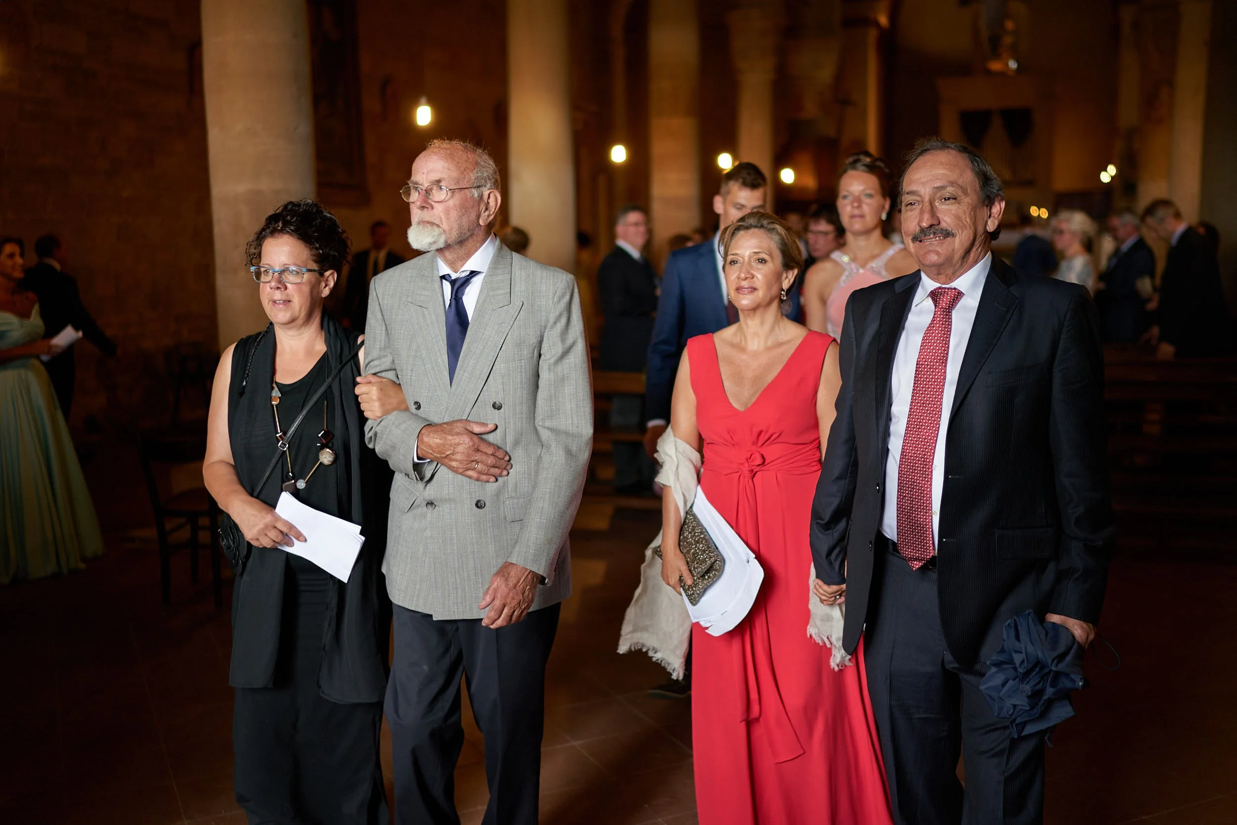 Wedding guests inside the church.