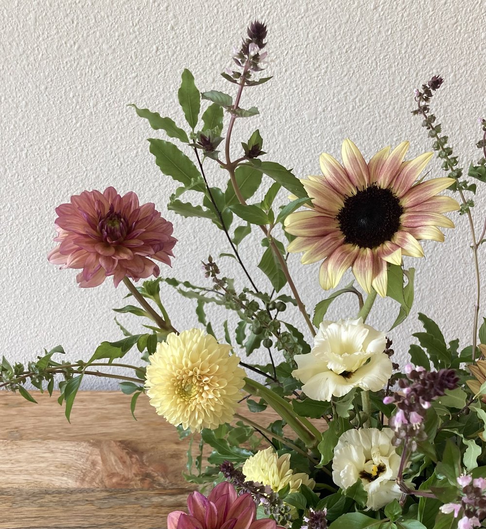 An arrangement of flowers on a table