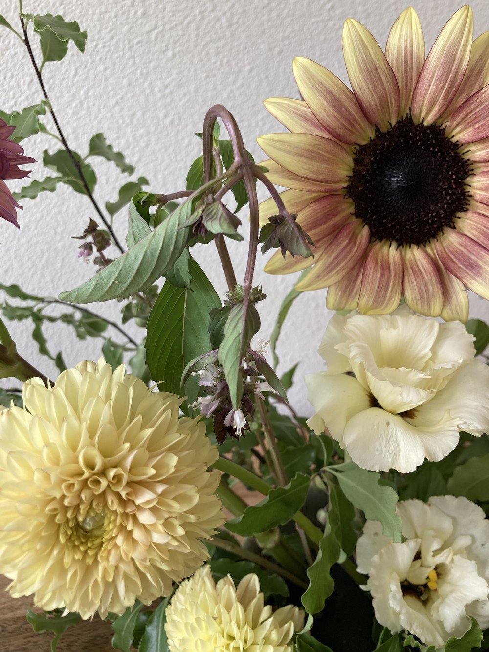 An arrangement of flowers on a table