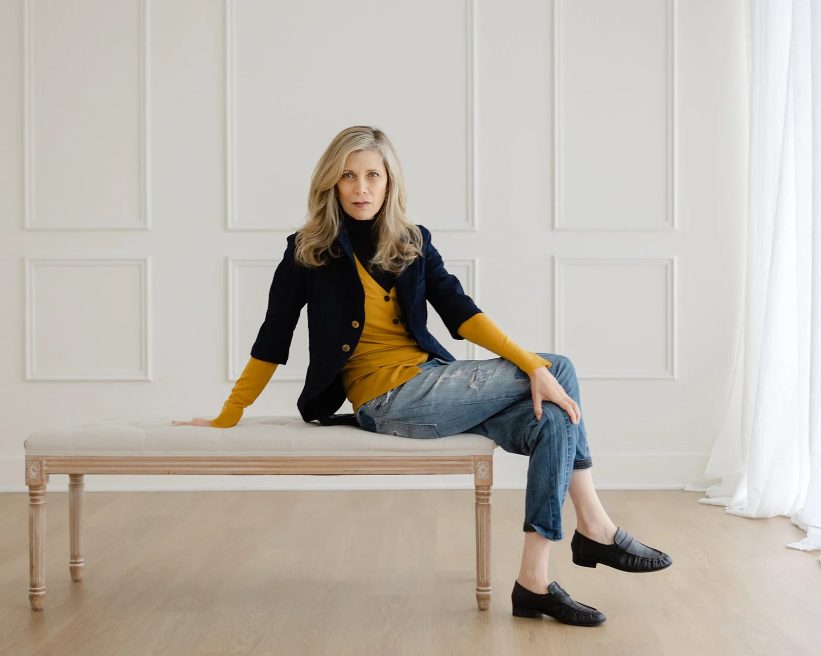 Dayna Pink seated, full length portrait by Christine Harris, 50 Women Project