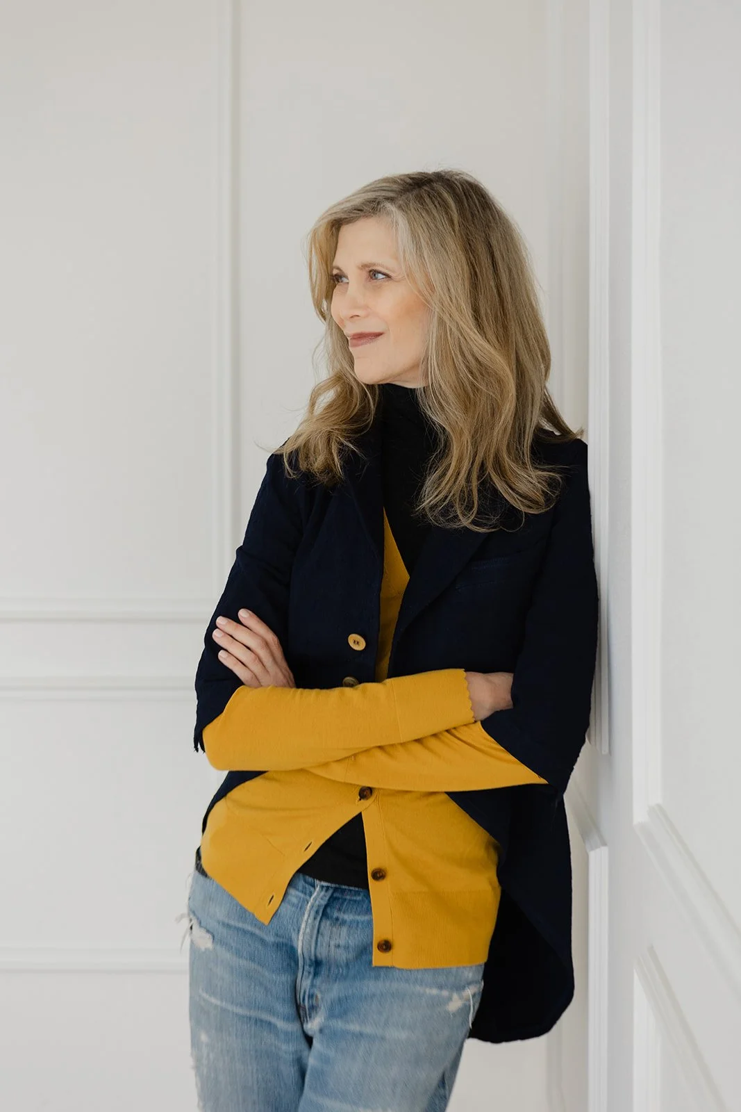 Here is the image title and body text for both sets: Diptych 1 (navy blazer, mustard cardigan, arms crossed) Image Title: Dayna Pink | 50 Women Project