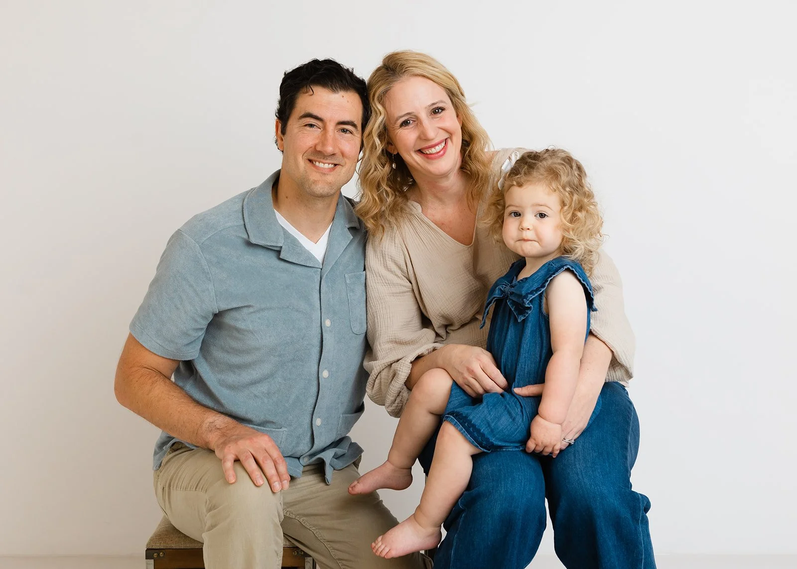 A relaxed studio portrait of the Lopez family photographed in Westlake Village.