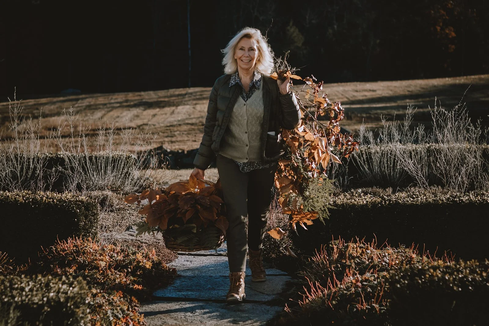 Sharon Santoni of My French Country Home Magazine foraging in the autumn fields at Tahilla Farm in Peterborough, New Hampshire