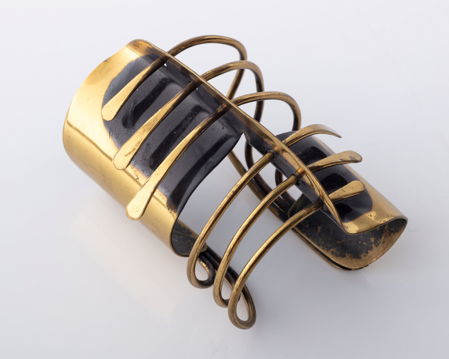  Modern Cuff bracelet in brass and copper. Designed and made by Art Smith, USA, 1946-82. 