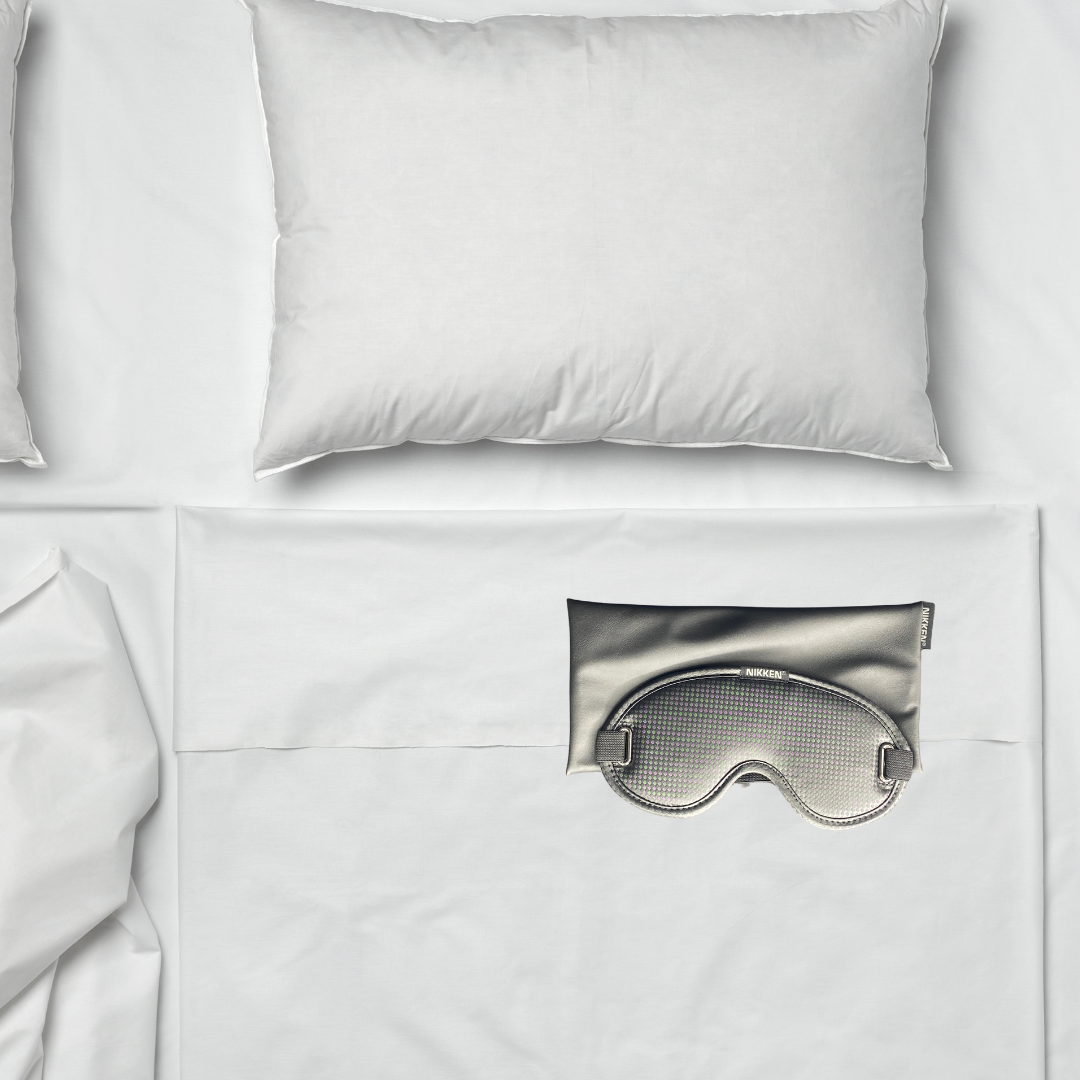 Sleep Mask on Bed 2.png