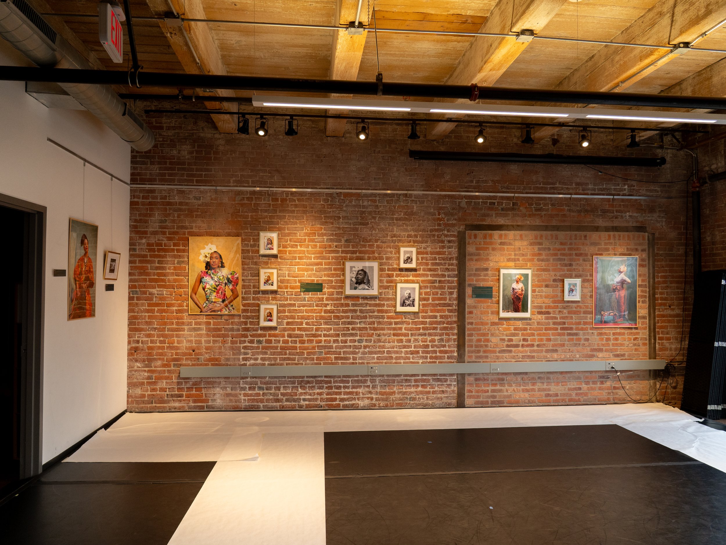 Steffie's art displayed in the open workspace at the CEI