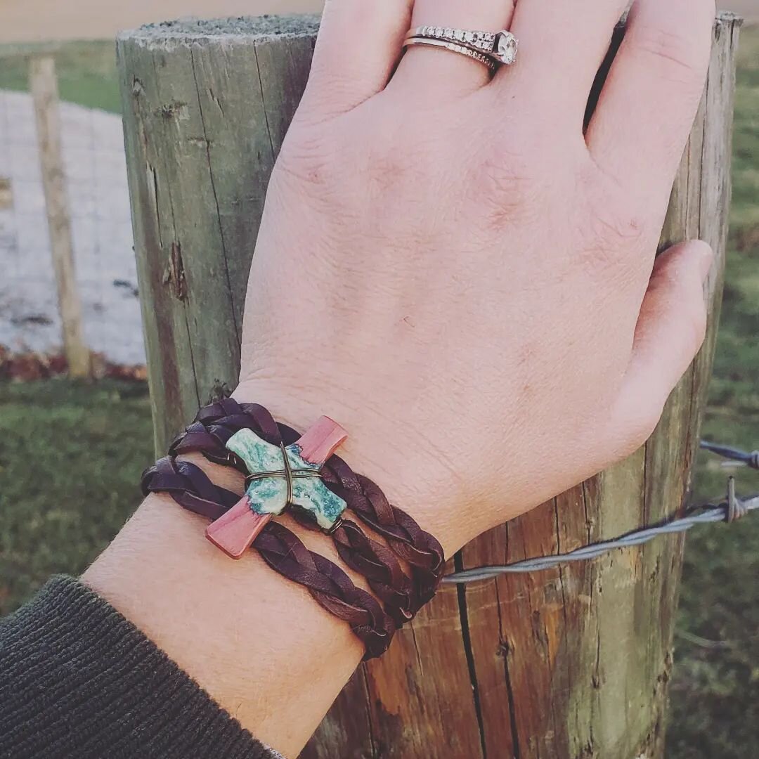 Shown here is a new piece I have been working on - cross wrap bracelet!

A wood and resin cross is fixed to braided deerskin leather with wire. Wrapped three times and connected in the back with a clasp and extender chain. 

Bracelets have always had