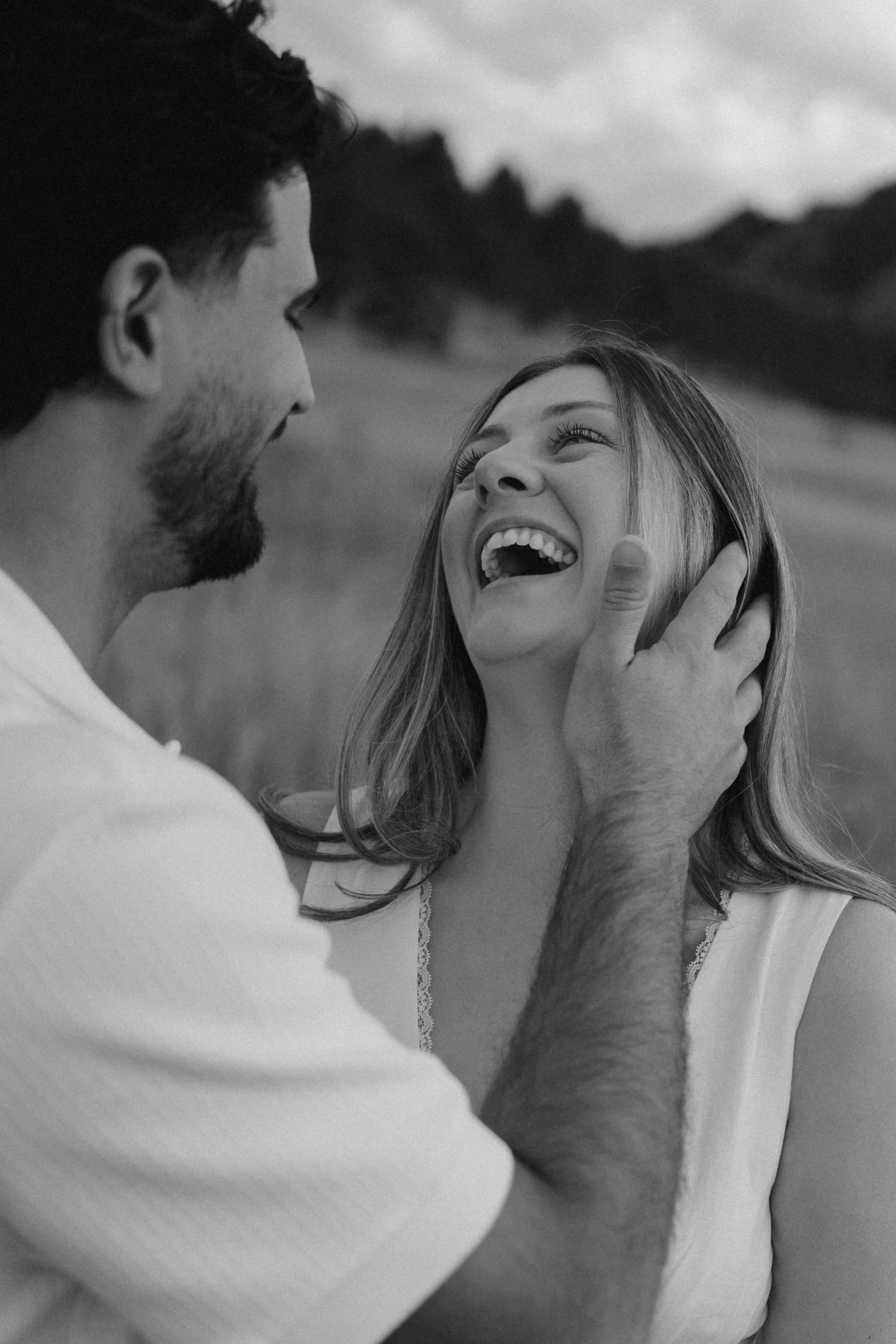 candid engagement photo at Chautauqua Park in Boulder