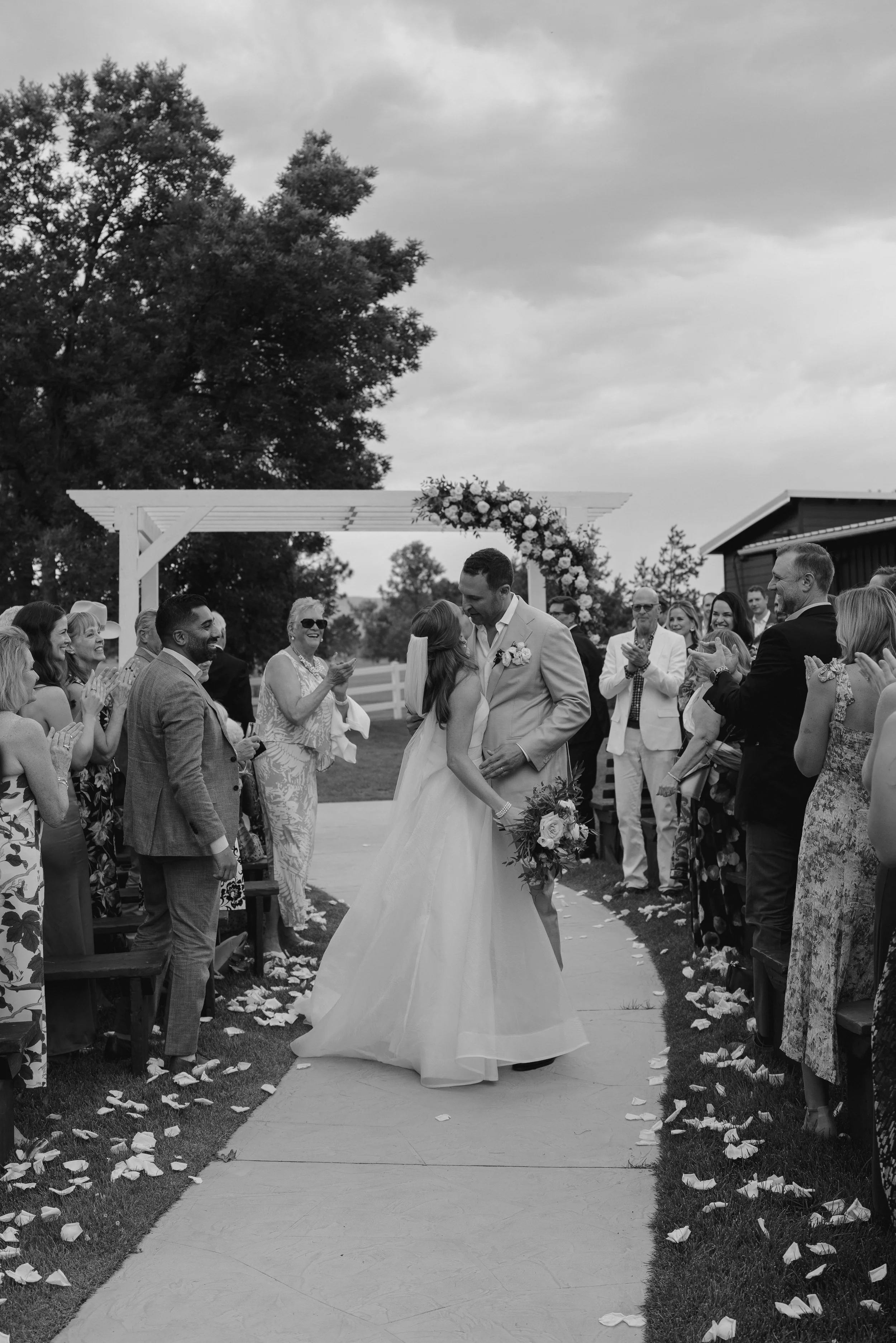 bride and groom kissing after the ceremony at The Barn at Raccoon Creek