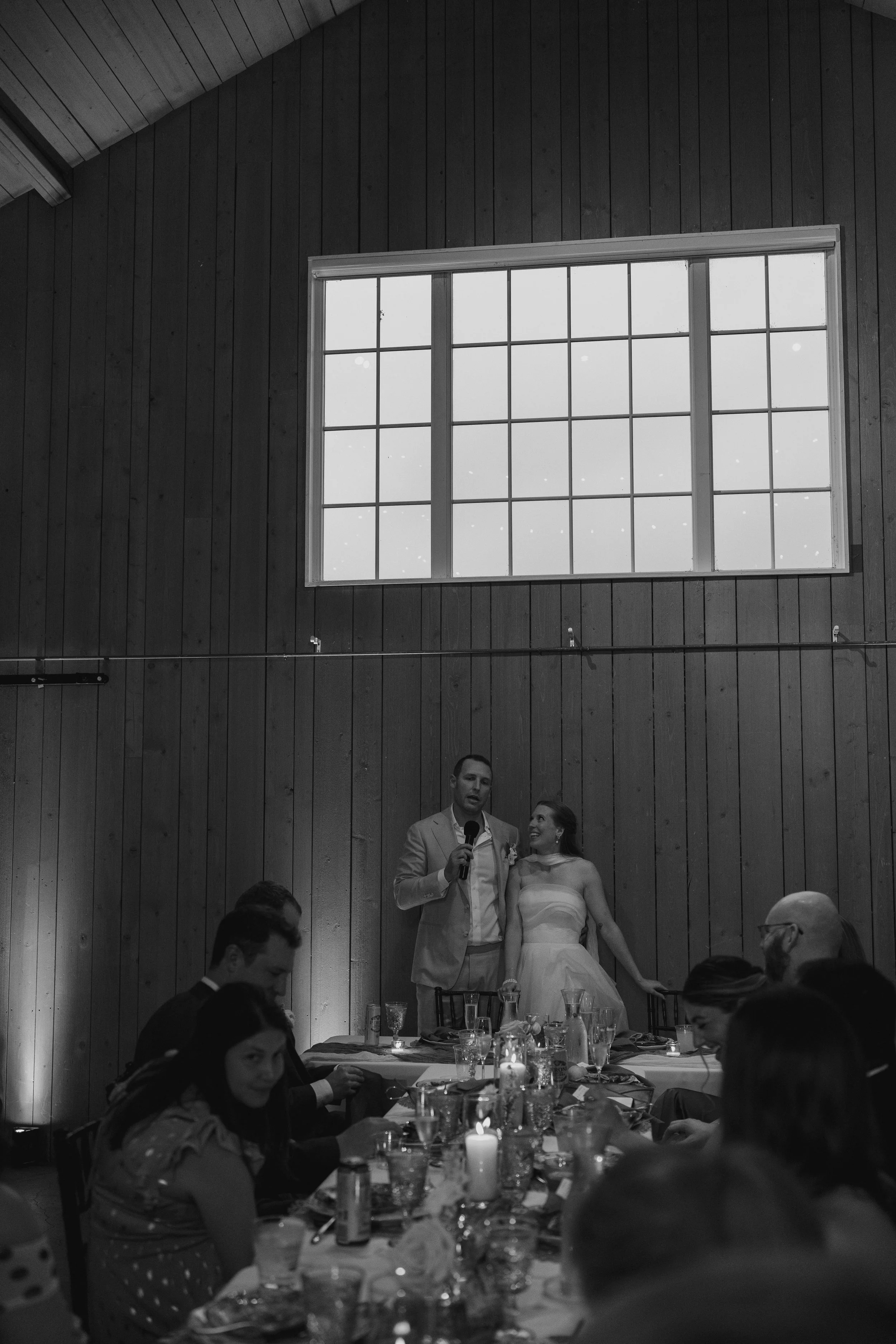 bride and groom giving speeches at the reception at The Barn at Raccoon Creek