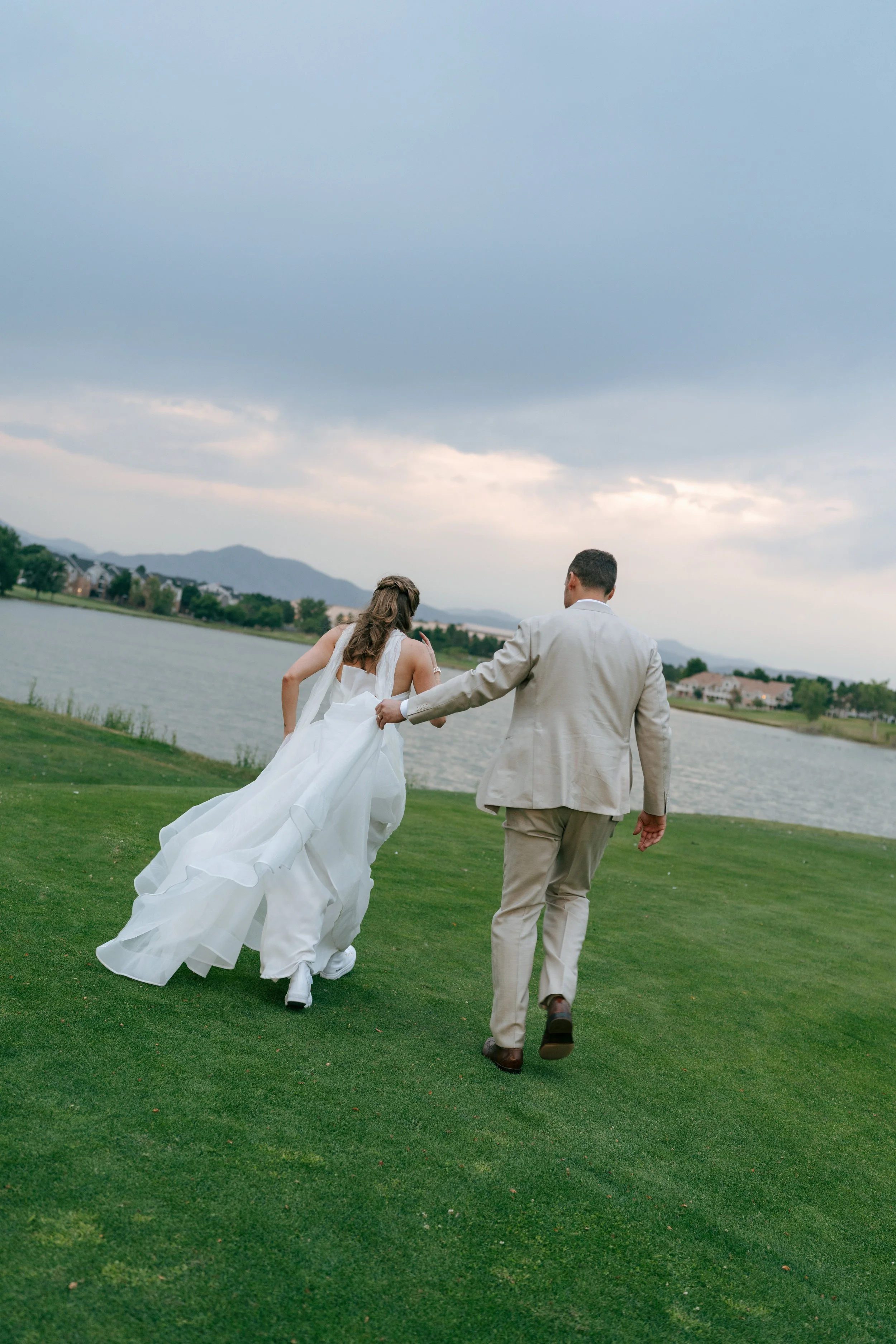 bride and groom portraits by the lake