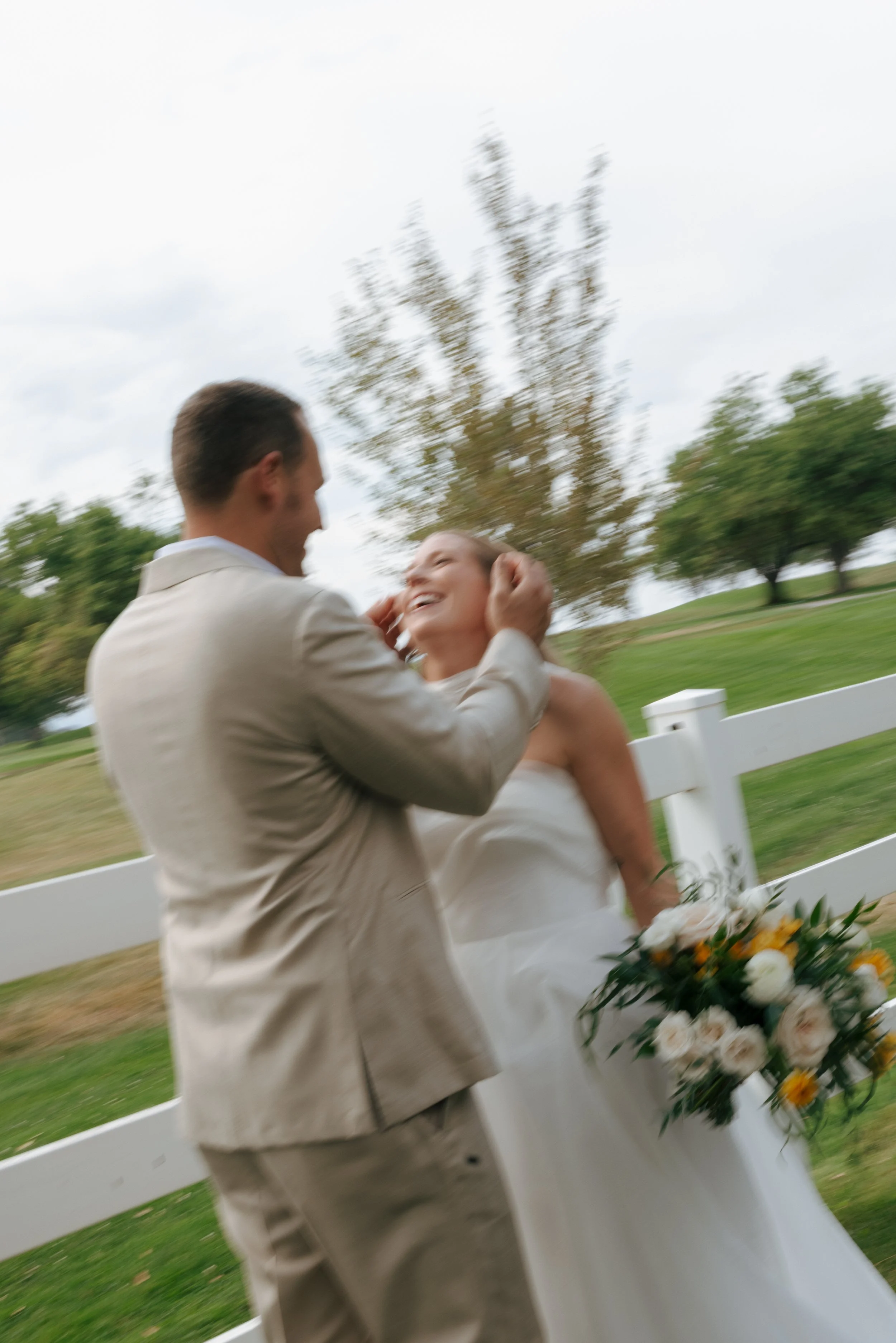 blurry portrait of the bridal couple at The Barn at Raccoon Creek