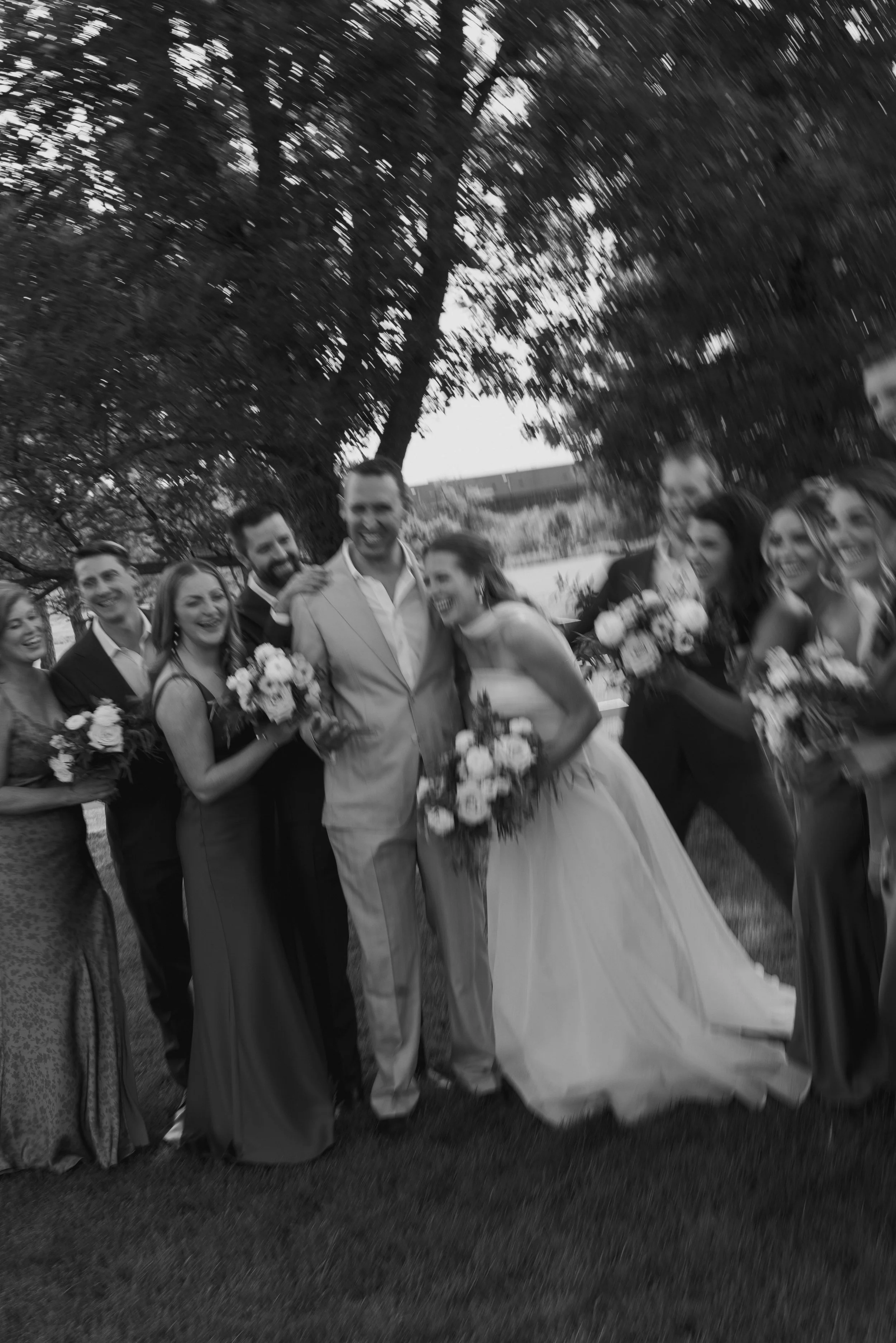 candid blurry wedding party photo at The Barn at Raccoon Creek