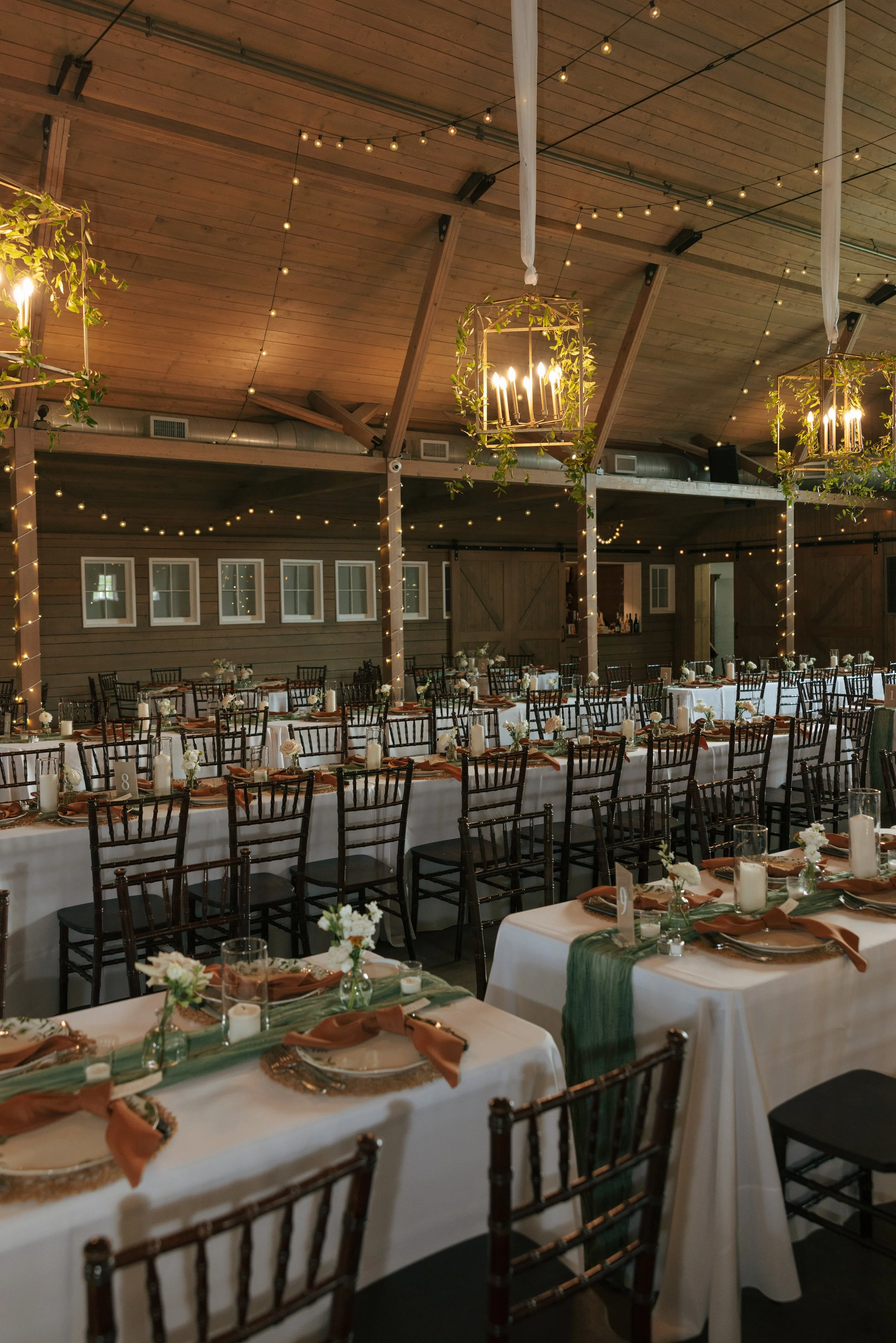 wedding reception set up with twinkling lights at The Barn at Raccoon Creek