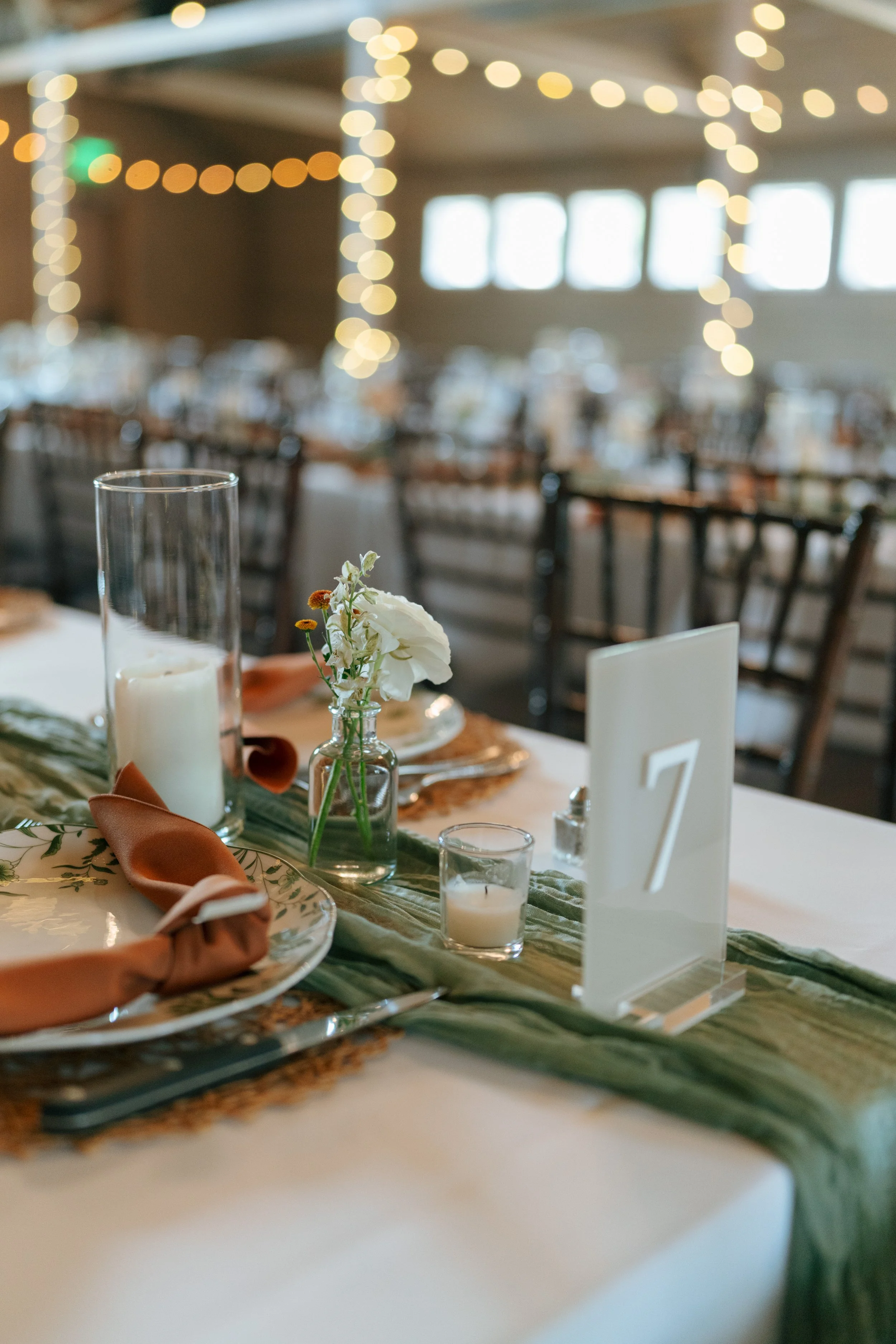 wedding reception table setting at The Barn at Raccoon Creek