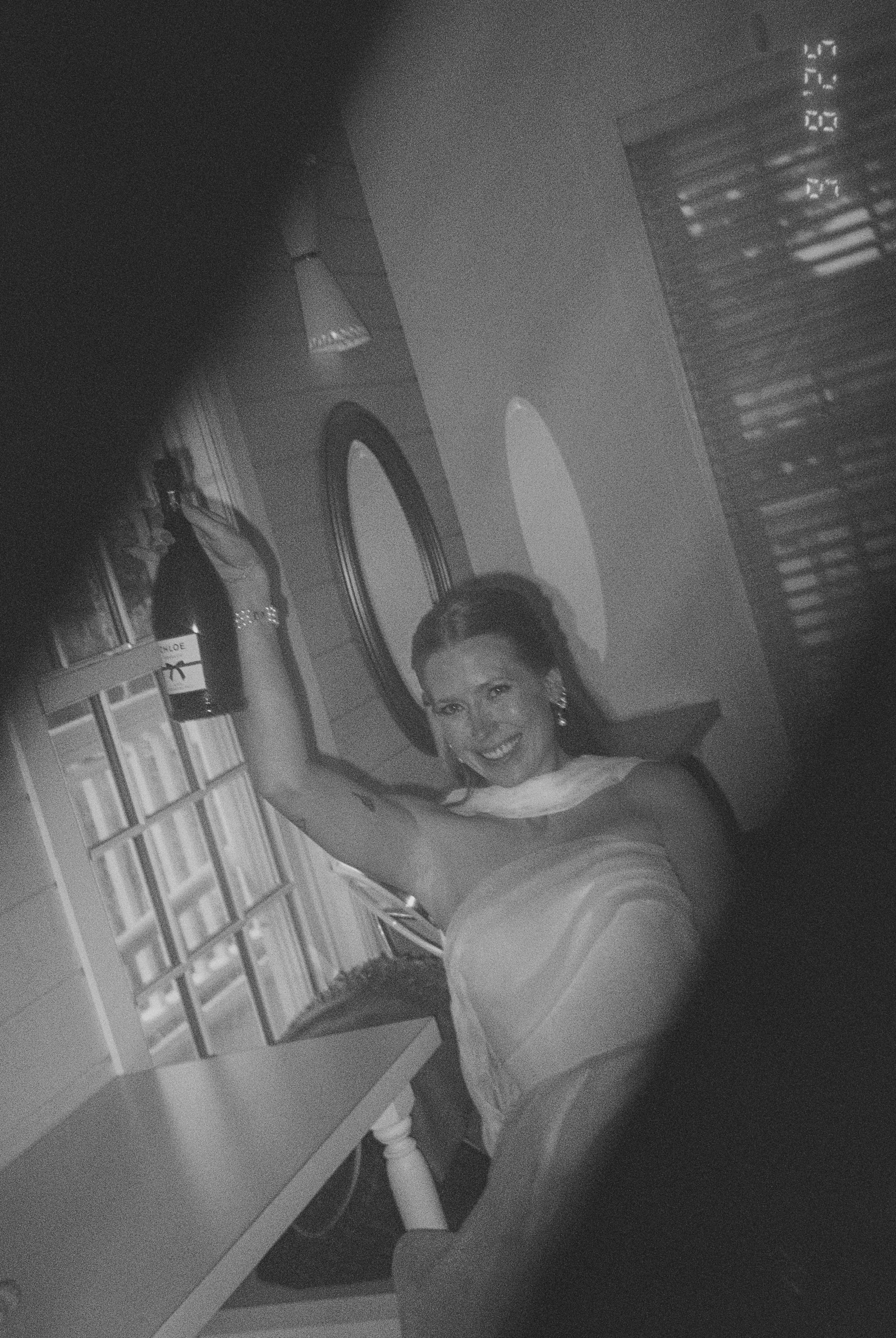 film photo of the bride with champagne 