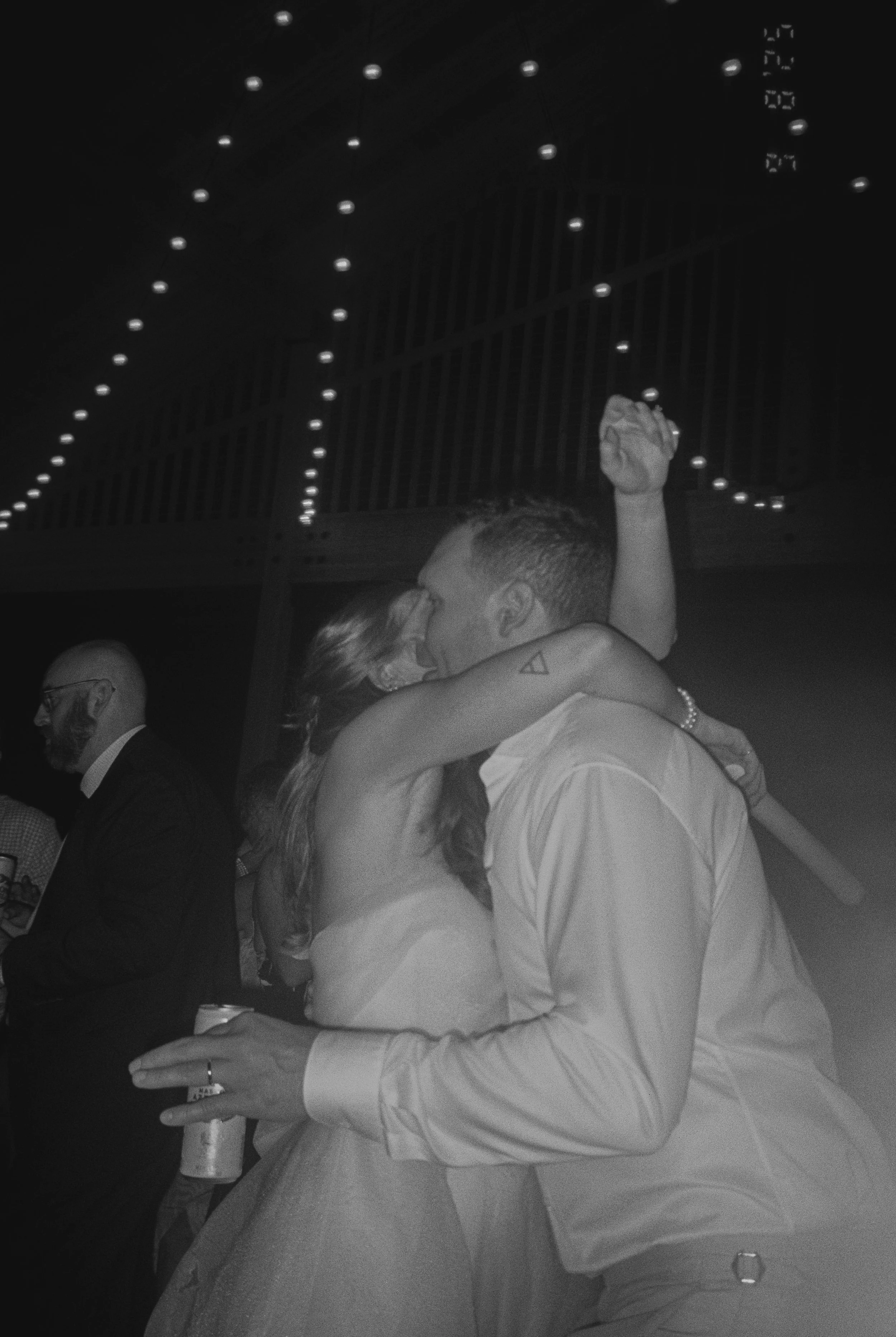 bride and groom hugging at the dance at The Barn at Raccoon Creek