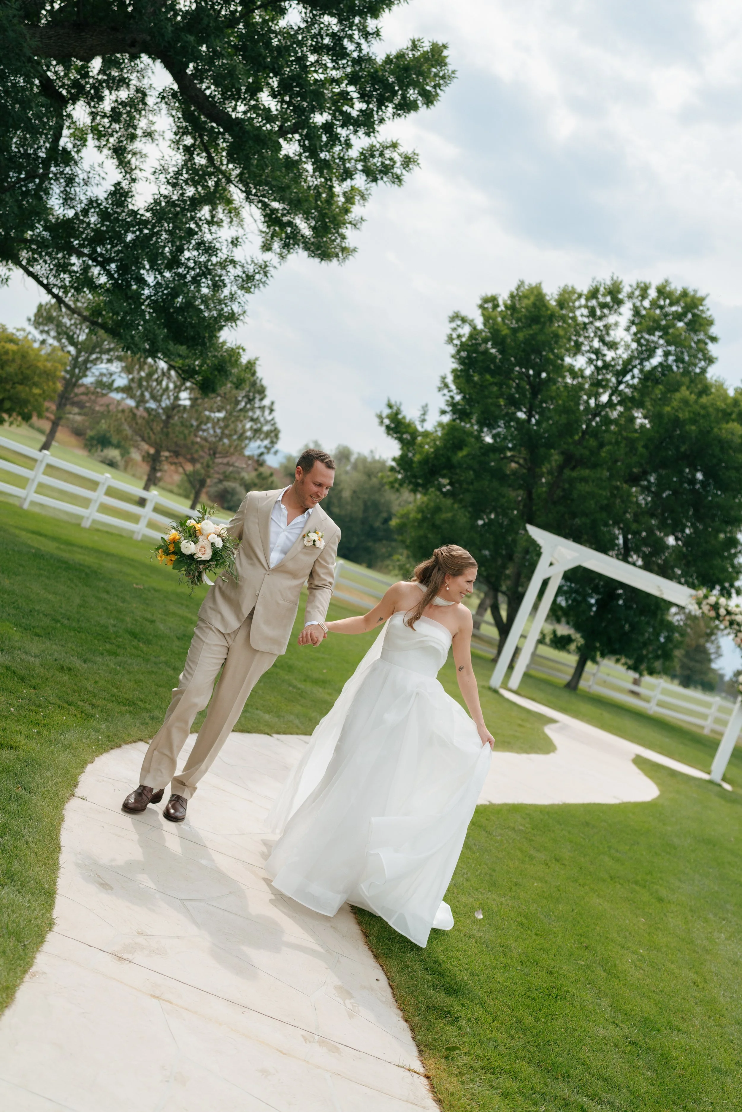 bride and groom walking down the ceremony aisle 