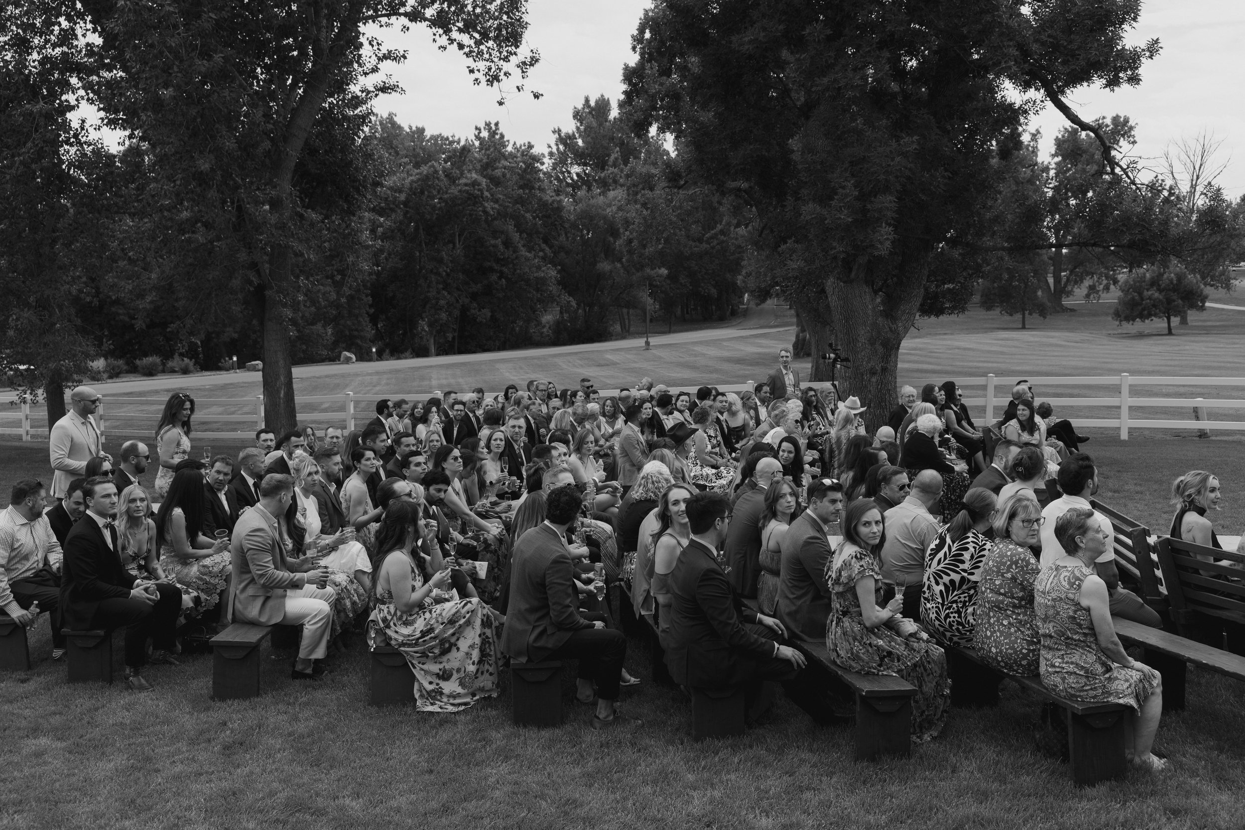 wedding guests seated during the ceremony at The Barn at Raccoon Creek
