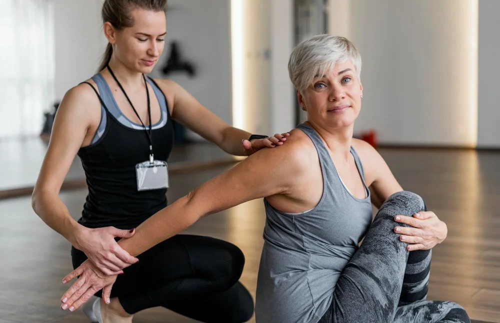 Doctor of Physical Therapy performing one-on-one manual therapy with an active adult patient at Zero Point One Physical Therapy in NoMad, New York, NY