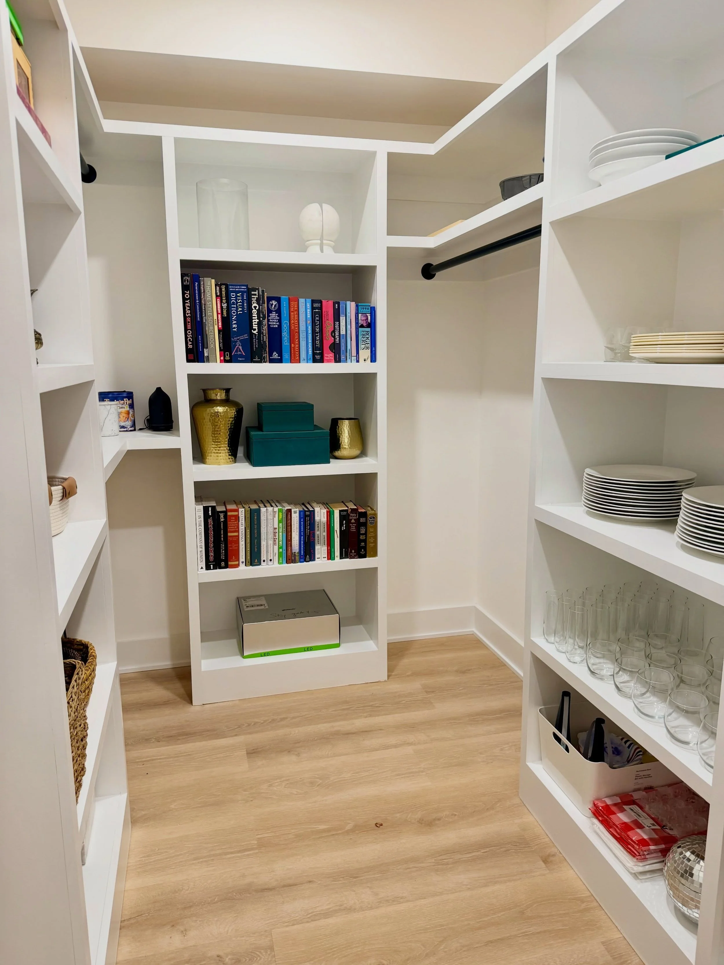 One thing we&rsquo;re seeing in a lot of new construction homes? More open shelving and fewer cabinets.

So when our clients needed more storage, we got creative and turned an extra basement closet into the perfect home for seasonal, entertaining, an