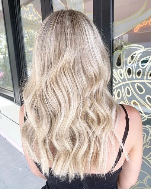 Lady with blonde hair | Featured image for the Event Hair Styling Page by Marigold Bulimba.