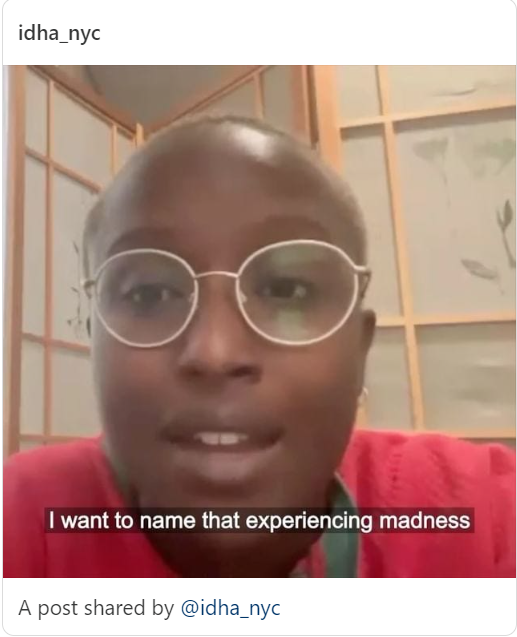 Instagram post by @IDHA_NYC. A video frame of a Black person speaking, wearing gold glasses and a red shirt, with caption that reads "I want to name that experiencing madness"