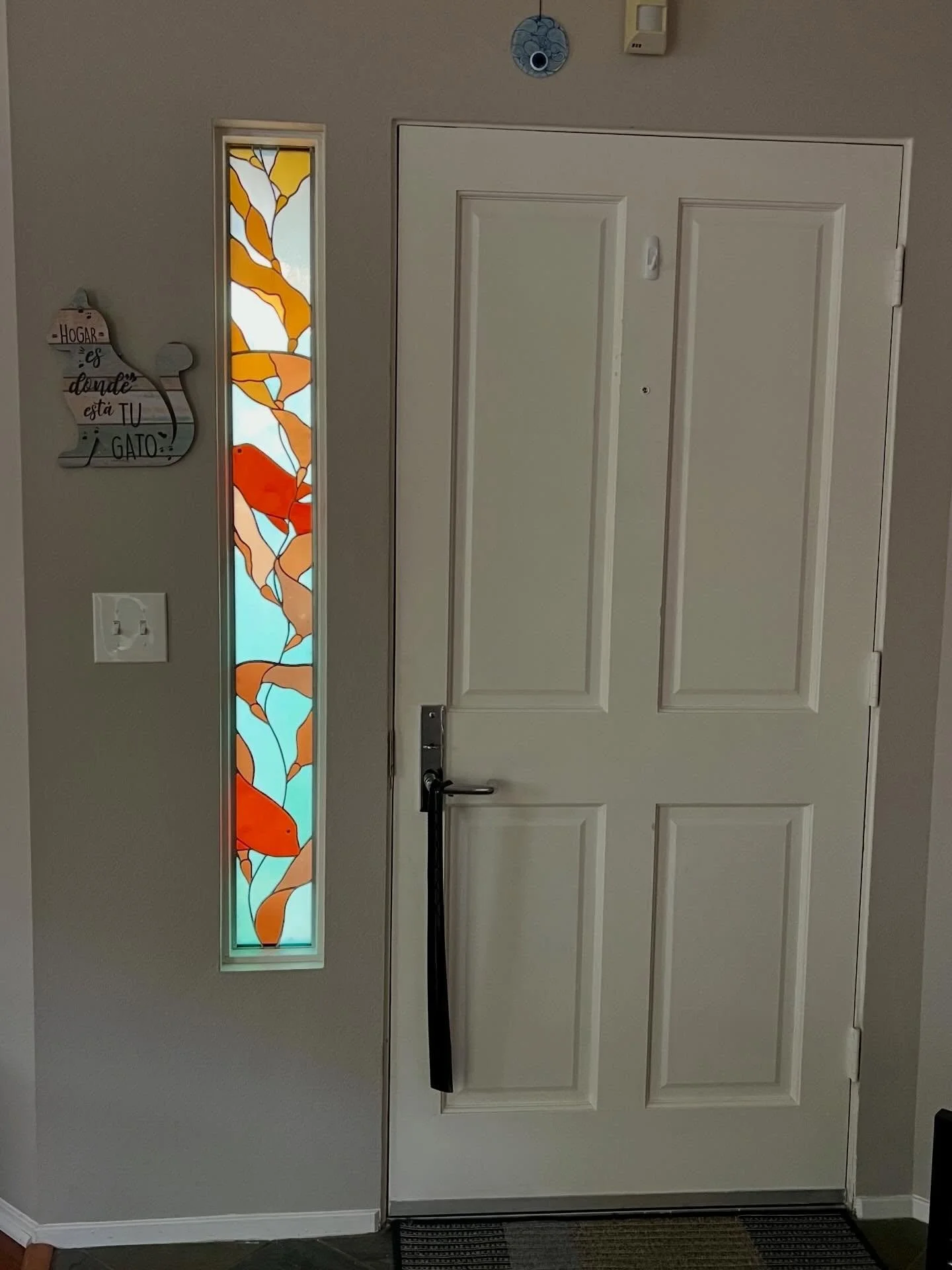 When she said kelp forest and garibaldi, I knew I was 💯% in. Love this front door side light! #kelpforest #oceanart #sandiegohomes #stainedglassart #seaweedart