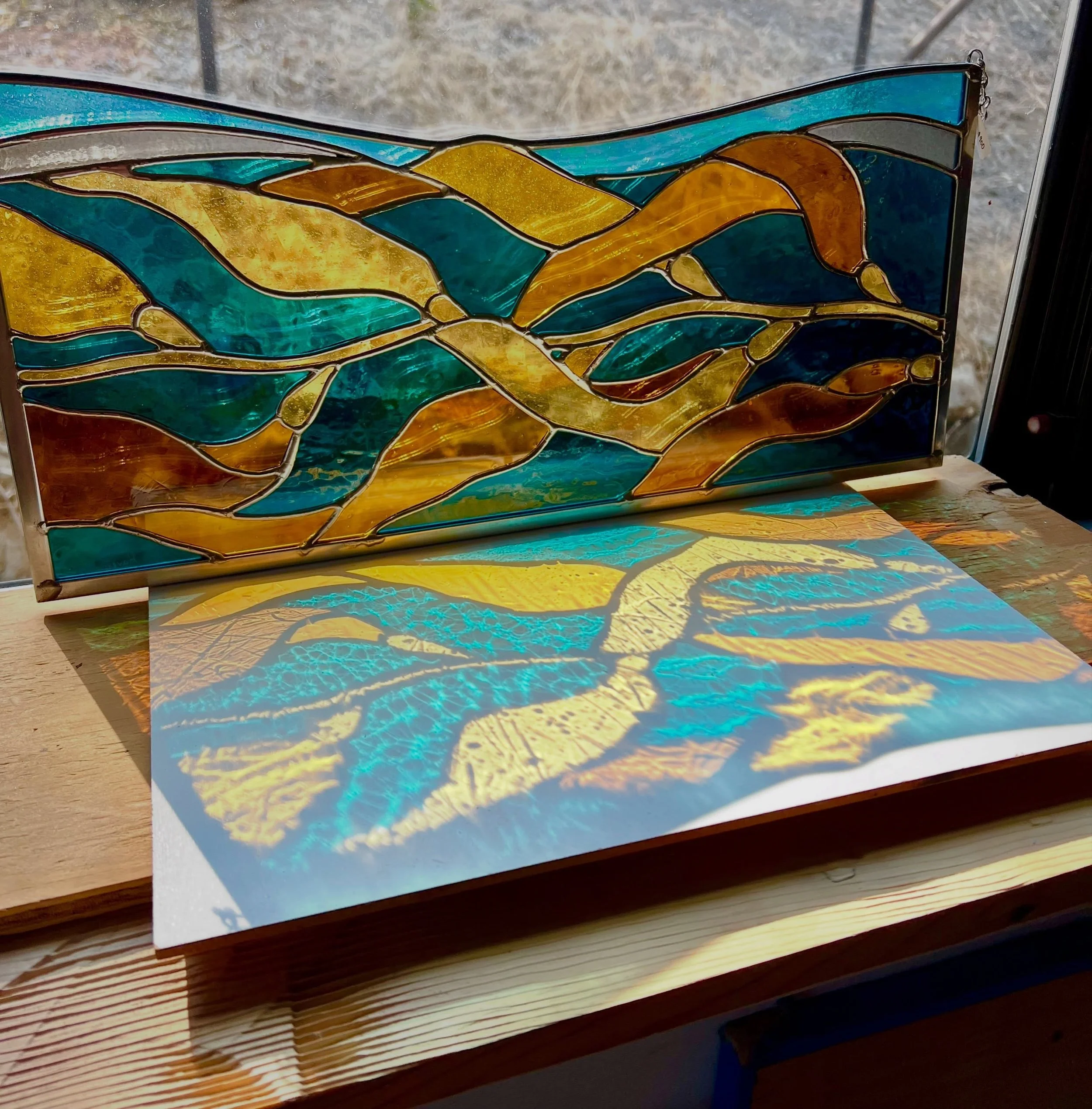Waterline 8&rdquo;x18&rdquo; throwing some scrumptious refractions. #stainedglassseaweed #stainedglassart *available*