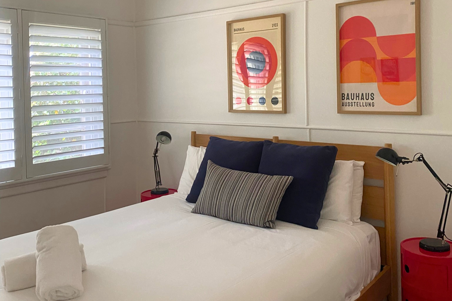 Comfortable master bedroom in Katoomba holiday house with a queen bed, quality linen and plantation shutters.