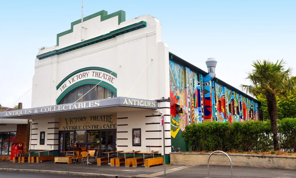 Victory Theatre Blackheath exterior with café entrance, outdoor seating, and colourful mural wall