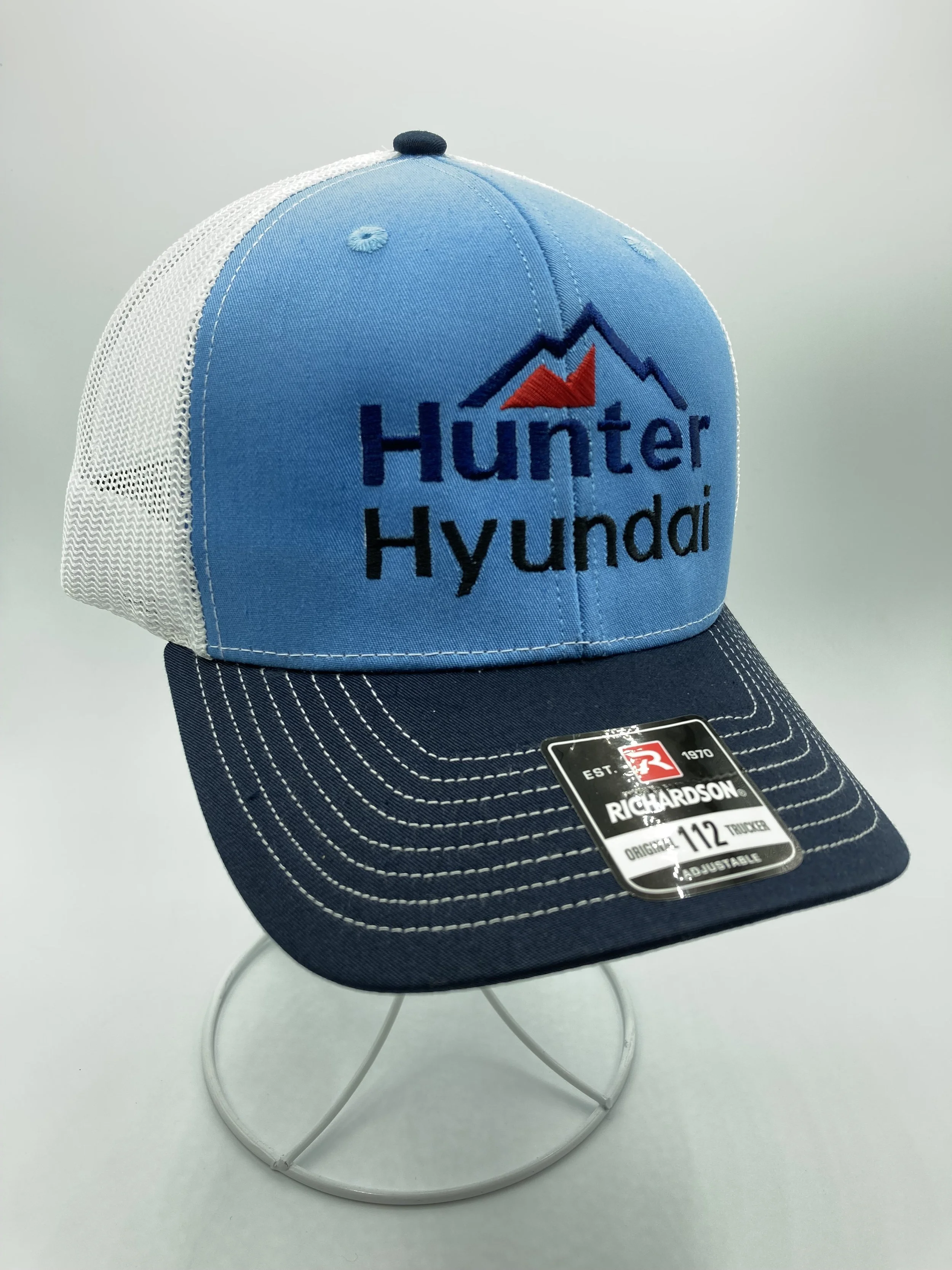 Branded hats with embroidered company logo