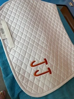 Personalized saddle pads