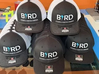 Branded hats with embroidered company logo