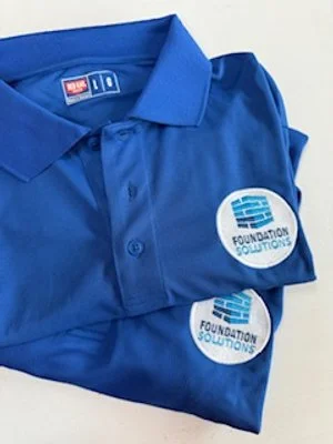 Custom embroidered polos for a local Asheville business