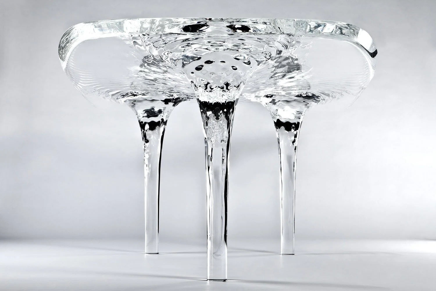 Liquid Tables By Zaha Hadid Design Takes Sculptural Aesthetic To Furniture