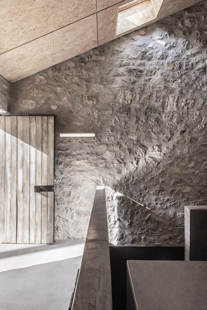 9_ Natural light effects on the interior reclaimed stone wall_ Photo by Athina Souli.jpg