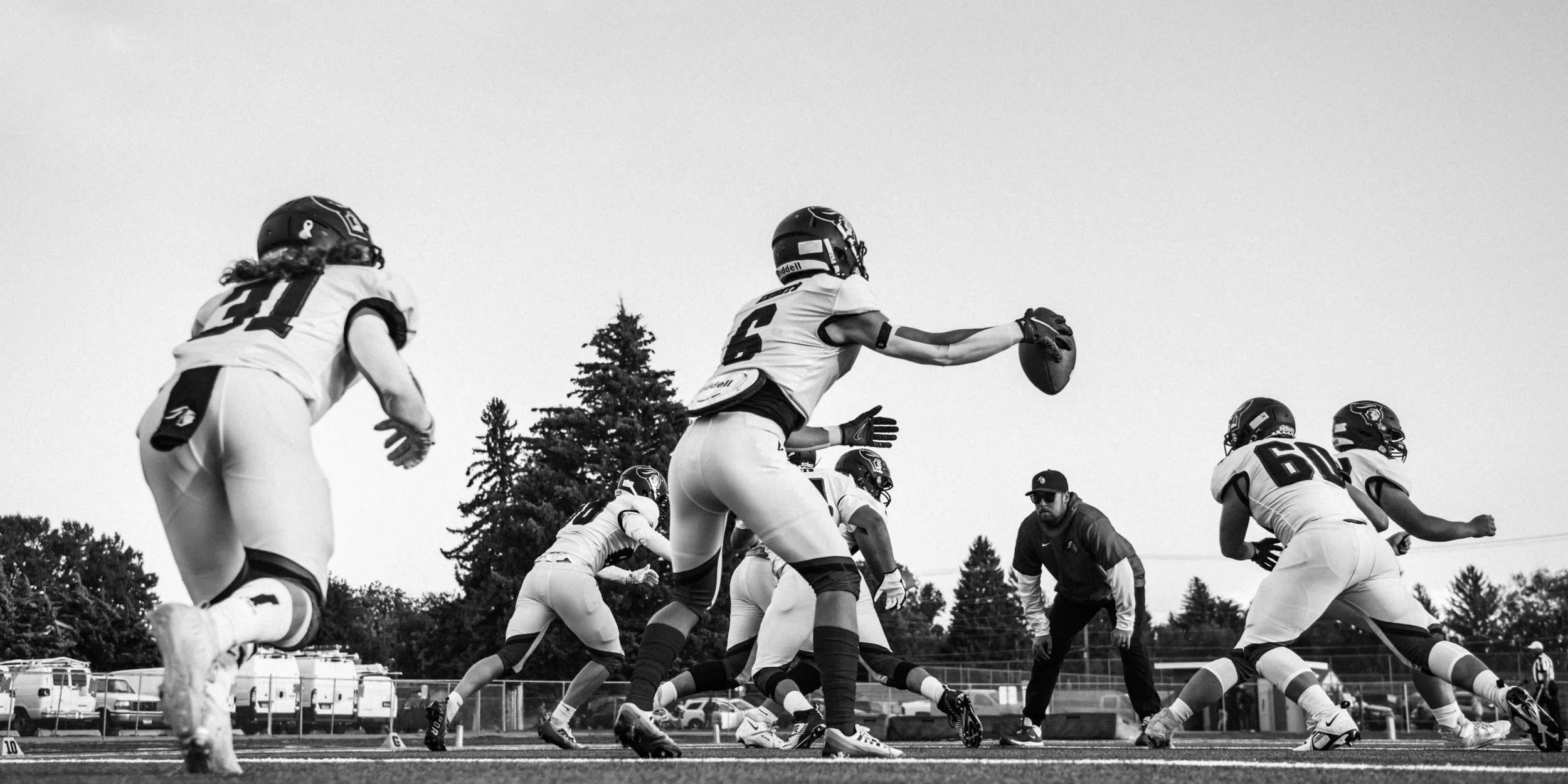 Black & white image showing an old american football team
