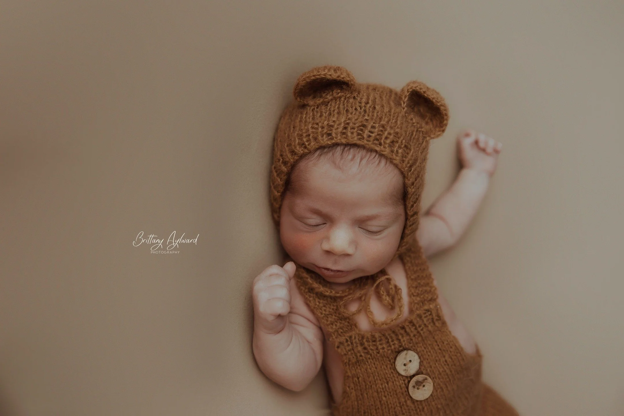 Baby Sawyer :)

I got a different newborn poser for my studio and I finally used it. When it's set up it looks like Malik's bed -but works great! I do have a bean bag for newborns but I find it annoying- this thing is great and easy to take apart and