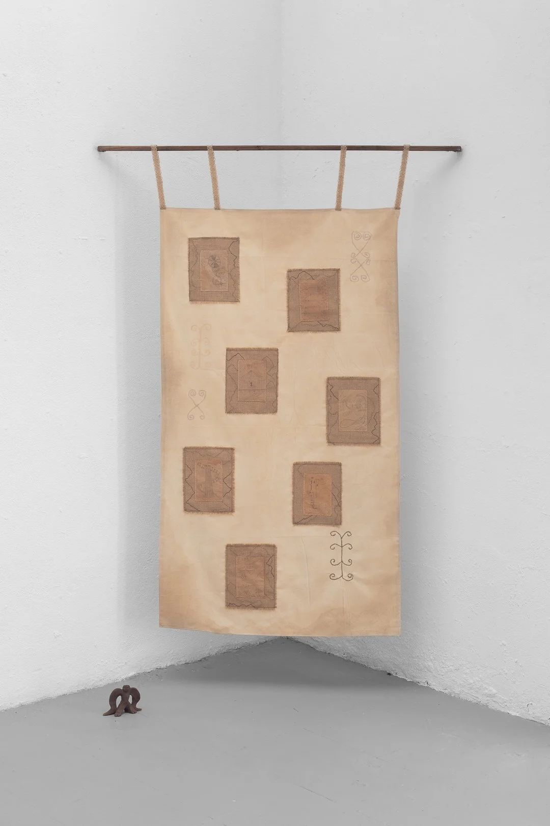 Suri Park-Woo, Dust Signal and I. Pencil drawing on black tea-dyed paper, patchwork jute, canvas, clay angel statue 87w x
150h cm, 2026.