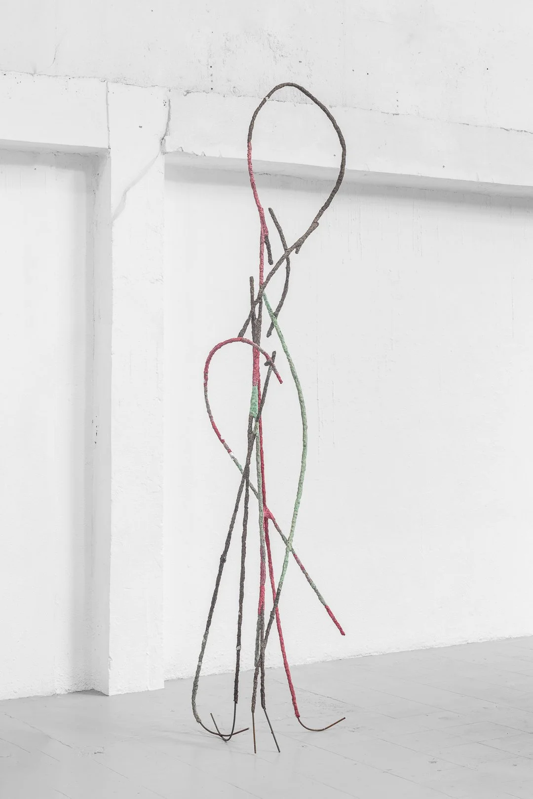 Jesse Strikwerda, Tale-Teller (vertical). Metal, paper mache, industrial waste, paint, silver paper, 70w x 350h x 70d cm, 2026.