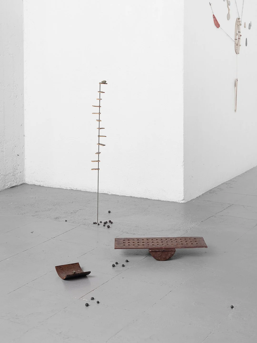 Gaia D’Arrigo, The fool’s playground. Ceramic, industrial waste glaze, unknown spheres, Pyrite 60 x 30 cm, 2026