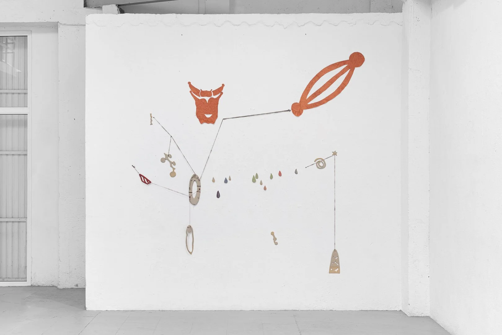 Marta Troya, Heart–Throat Constellation. Ceramics, wool and cotton thread, dyed canvas. Wall installation, 2026