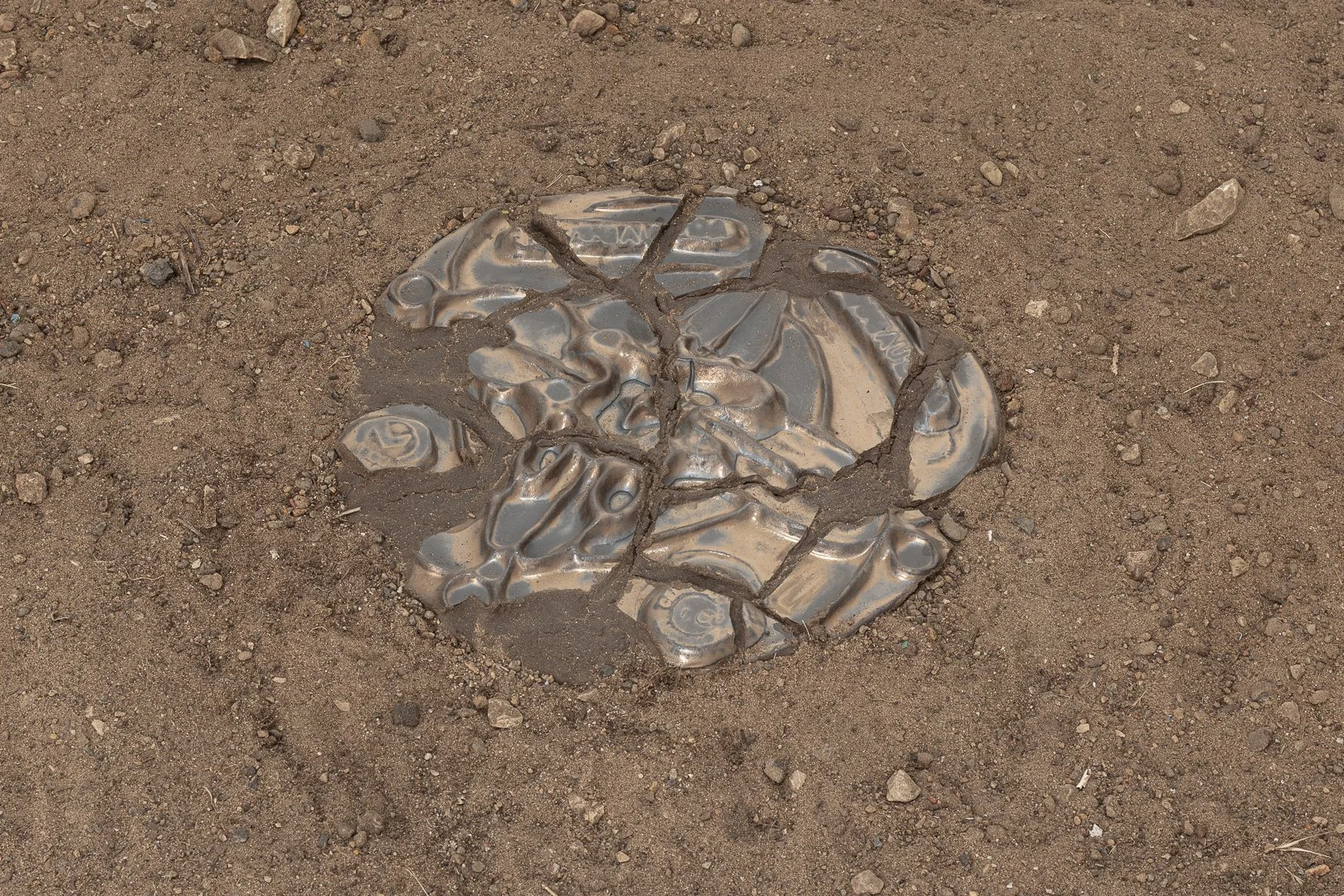Hanna Orion, Urban Anatomy. Ceramic, glaze, earth, sand, 40w x40h , 2026.