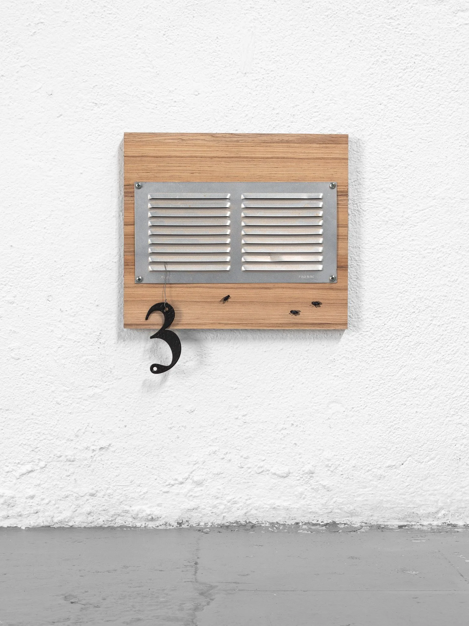 Dirk Hoogeveen, Escape vent 01. Reclaimed wood, airvent, steel housenumber, acrylic, 29 x 34 x 2 cm, 2026.