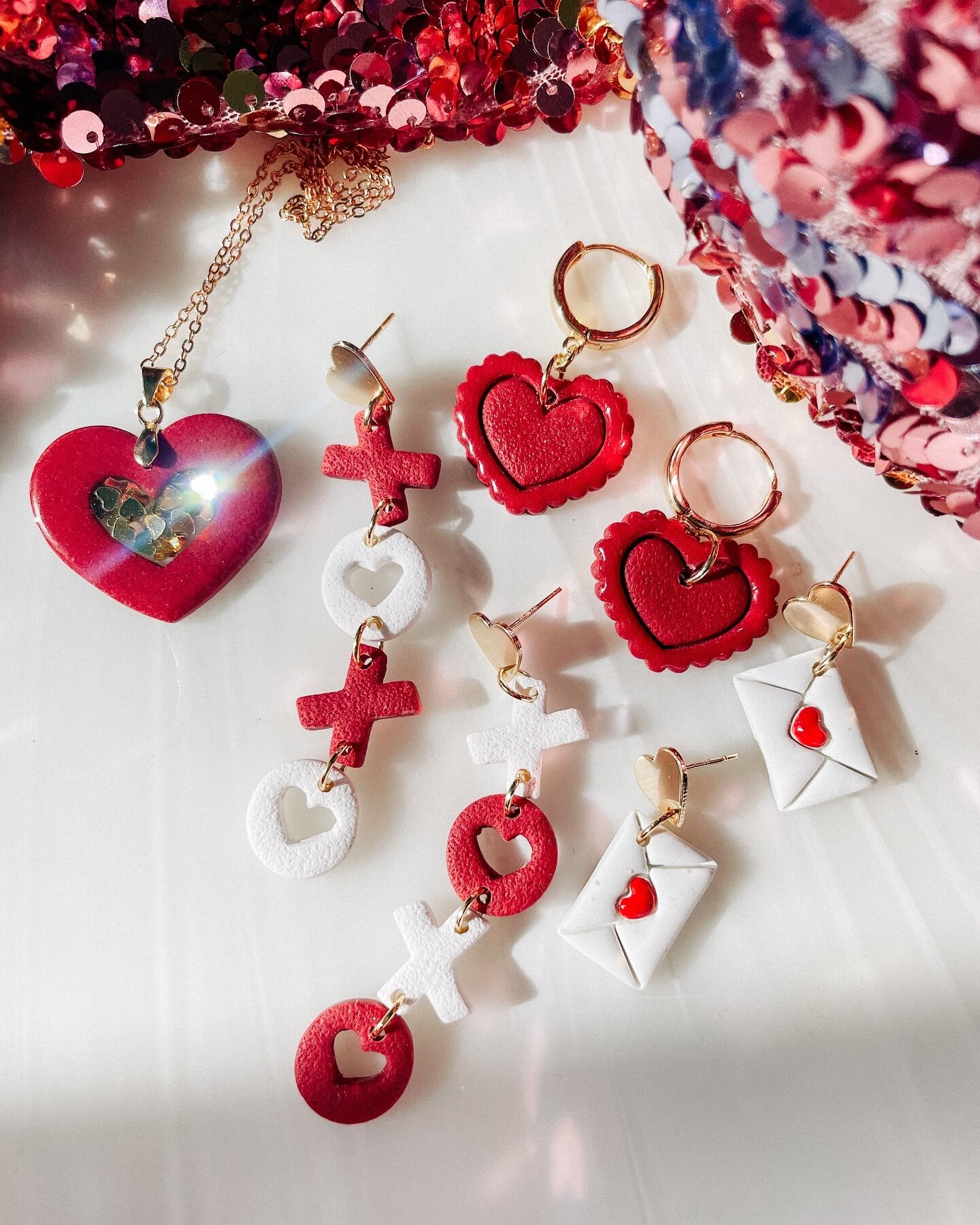 A little collection of Valentine goodies I made for my little loves and I! 💋 XOXO! #valentinesday2024

Fun fact: my daughter designed, rolled the clay, cut and then picked out glitter for her own lil necklace and my heart looked like this whole time